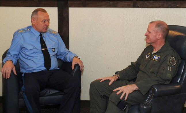 Gen. Lt. Anatoliy Dmitriyevick Zhikharyev, Russian Long Range Aviation and Delegation commander, speaks with Maj. Gen. Stephen Wilson, 8th Air Force commander, on Barksdale Air Force Base, La., July 11. Zhikharyez and Wilson spoke about key issues, and differences and similarities between their respective commands. The Air Force Global Strike Command will send a few of their own command staff to Russia to conduct a similar site survey of a Russian Air Force facility. By doing so, both militaries will have a general understanding of their counterpart's operational capabilities. (U.S. Air Force photo/Airman 1st Class Benjamin Gonsier)(RELEASED)
