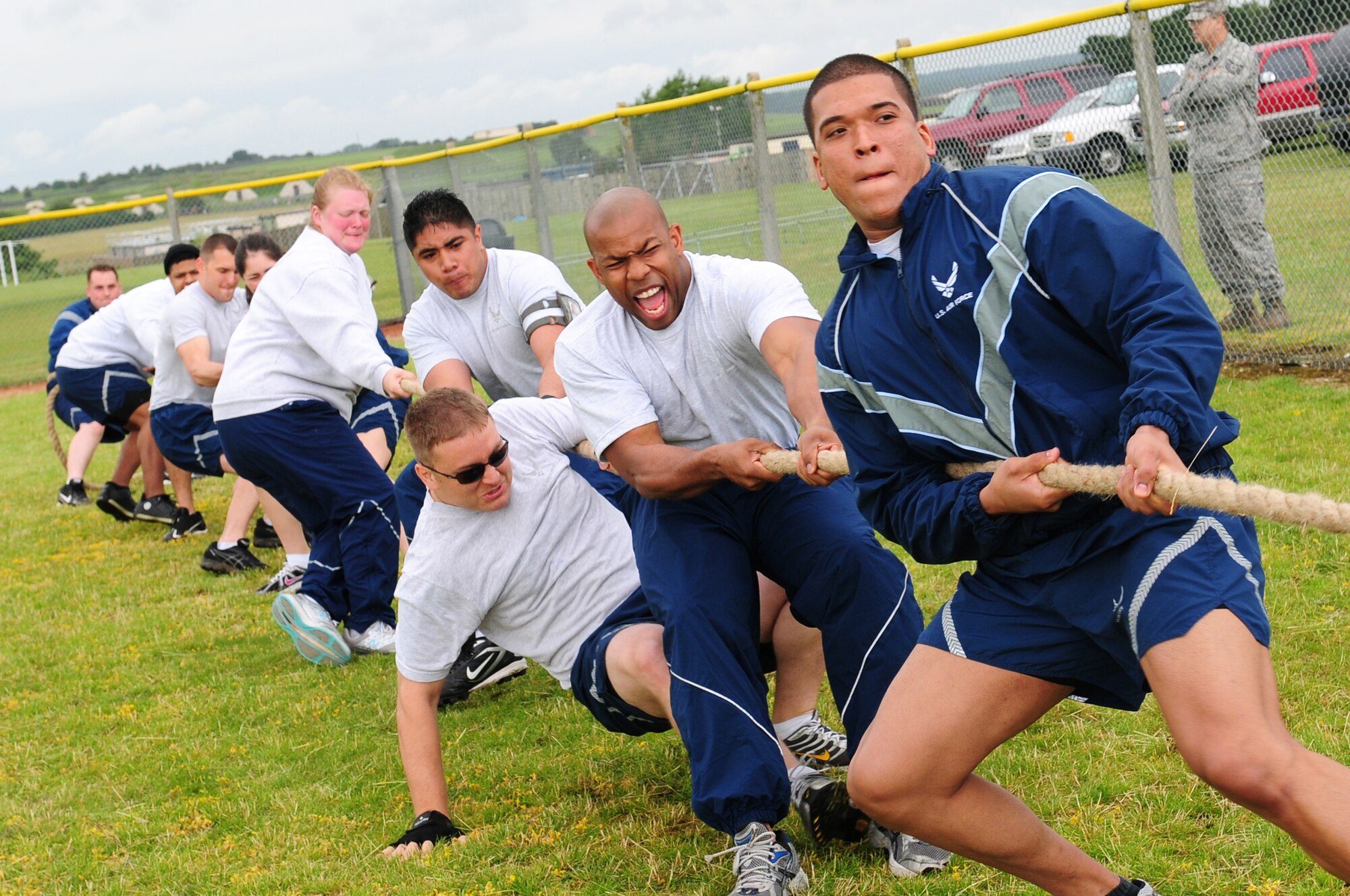 ROYAL AIR FORCE LAKENHEATH, England - The 48th Component Maintenance Squadron competes in a tug-of-war competition during the Liberty Olympics July 13, 2012. The Liberty Olympics offered 48th Fighter Wing Airmen and their families a day of friendly competitions such as dodge ball, a 5K fun run, ultimate frisbee and other activities. (U.S. Air Force photo by Airman 1st Class Cory D. Payne)