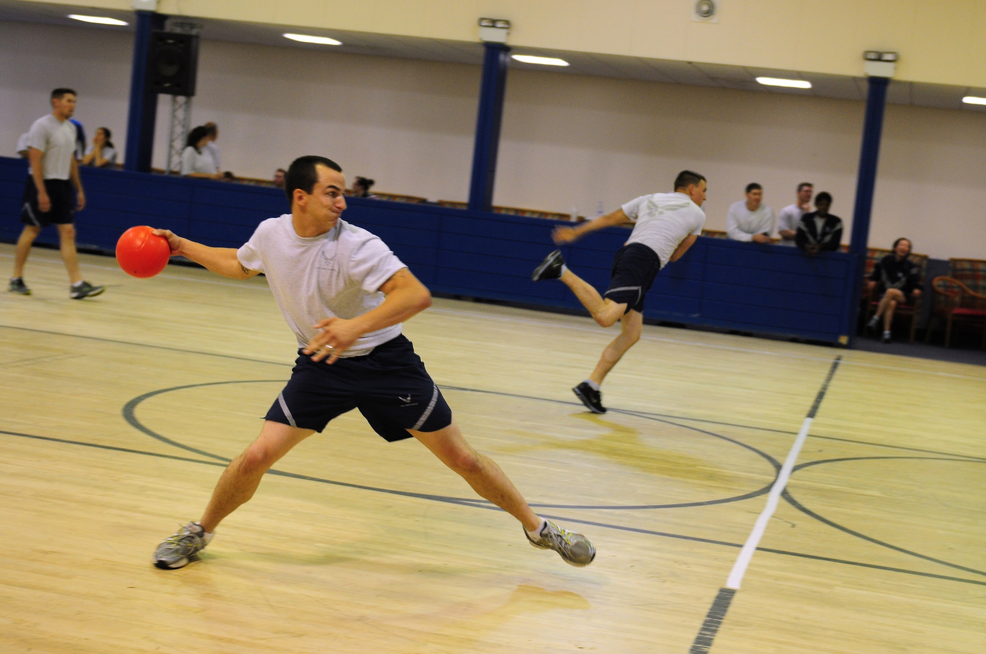 ROYAL AIR FORCE LAKENHEATH, England – Airman 1st Class Matt Brown, 48th Civil Engineering Squadron heavy equipment, lines up a throw during a dodge ball match during the Liberty Olympics July 13, 2012. The Liberty Olympics offered 48th Fighter Wing Airmen and their families a day of friendly competitions such as dodge ball, a 5K fun run, ultimate frisbee and other activities. (U.S. Air Force photo by Airman 1st Class Cory D. Payne)