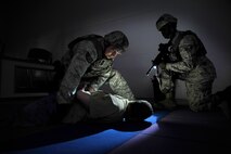 Members of the 35th Security Forces Squadron apprehend a simulated shooter during an Emergency Management Exercise at Misawa Air Base, Japan, July 17, 2012. The exercise tested emergency responder’s ability to coordinate accurate and timely response procedures to an active shooter scenario in a simulated environment. (U.S. Air Force photo by Staff Sgt. Nathan Lipscomb/Released)