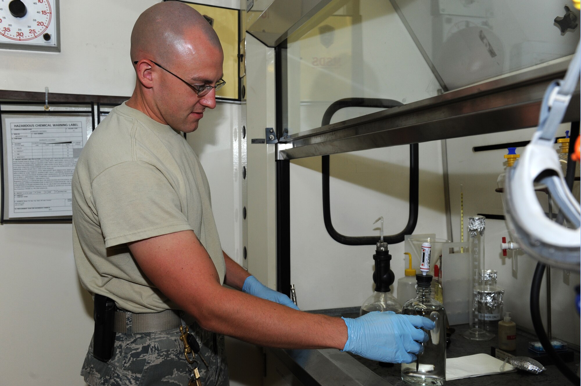 SOUTHWEST ASIA - U.S. Air Force Staff Sgt. Daniel Klinger, 380th Expeditionary Logistics Readiness Squadron Petroleum, Oils and Lubricants flight, tests the temperature of a fuel sample July 16, 2012. Klinger is the NCO in charge of the fuels laboratory. (U.S. Air Force photo/Master Sgt. Scott MacKay)