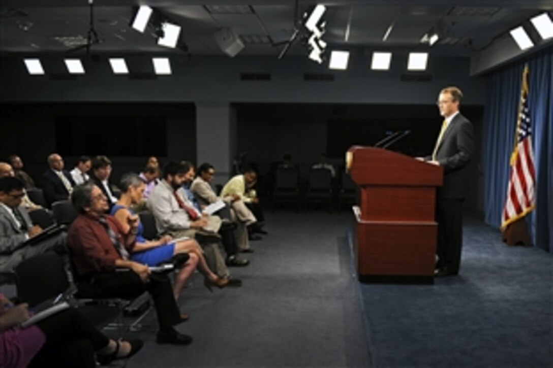 Pentagon Press Secretary George E. Little discusses defense-related issues during a media briefing at the Pentagon, July 17, 2012.