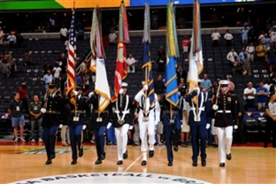 A multiservice color guard represents the armed forces as part of a pre-game event before an Olympic exhibition game between the U.S. Women’s National basketball team and the Brazilian Women’s basketball at the Verizon Center in Washington, D.C., July 17, 2012. The U.S.team won 99-67. 