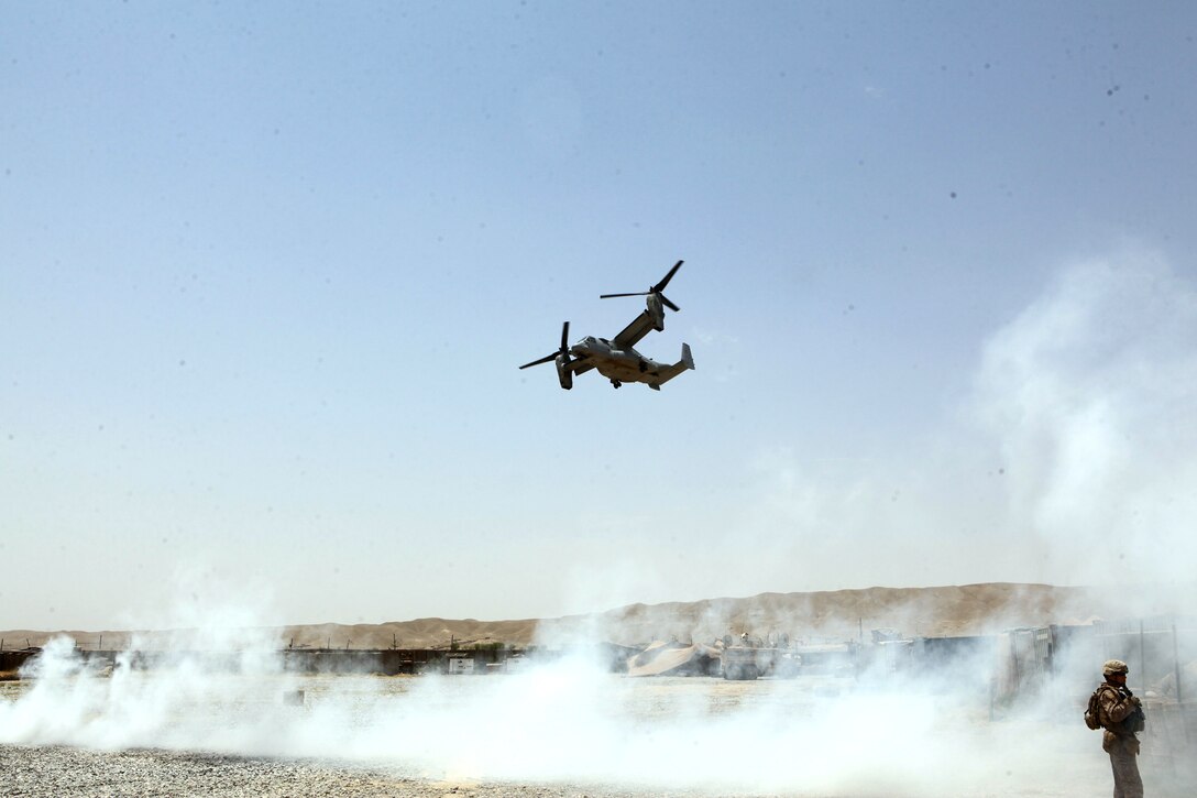 FORWARD OPERATING BASE JACKSON, Afghanistan – An MV-22 Osprey carrying Gen. James F. Amos, commandant of the Marine Corps, and Sgt. Maj. Micheal P. Barrett, sergeant major of the Marine Corps, prepares to land, July 17, 2012. During their visit, Gen. Amos and Barrett spoke with leaders of 1st Battalion, 7th Marine Regiment, and took the opportunity to take photographs with Marines of the battalion.
