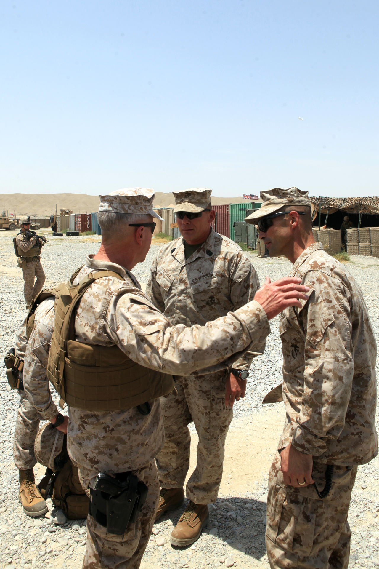 Lieutenant. Col. David Bradney, commanding officer, 1st Battalion, 7th Marine Regiment, and Sgt. Maj. Keith Coombs, the battalion sergeant major, greet Gen. James F. Amos, commandant of the Marine Corps, July 17, 2012. During their visit, Gen. Amos and Sgt. Maj. Micheal P. Barrett, sergeant major of the Marine Corps, spoke with the battalion’s leaders and took the opportunity to take photographs with Marines.