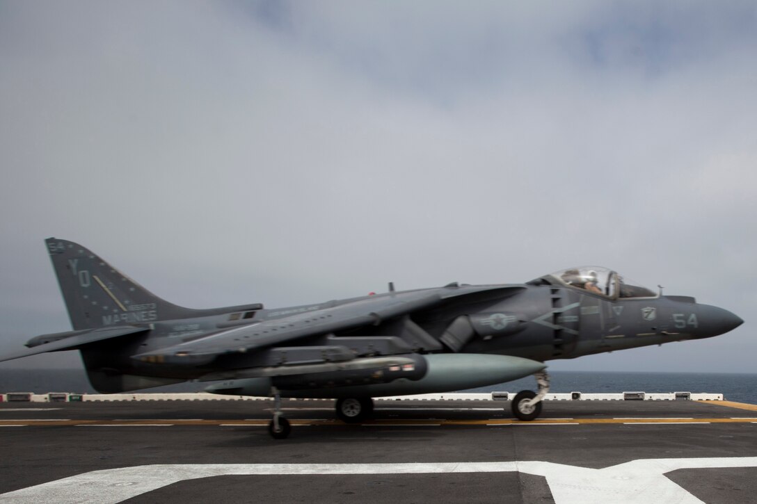 PACIFIC OCEAN -AV-8B Harrier pilot Capt. Marc Couvillon launches from USS Makin Island here June 20, returning to Yuma, Ariz., after a seven-month deployment to the Western Pacific, Horn of Africa and Middle East regions. Couvillon serves with Marine Medium Helicopter Squadron 268 (Reinforced), the aviation combat element for the 11th Marine Expeditionary Unit. The unit embarked the ship, as well as USS New Orleans and USS Pearl Harbor in San Diego Nov. 14. , Lance Cpl. Claudia M. Palacios, 6/20/2012 1:50 AM