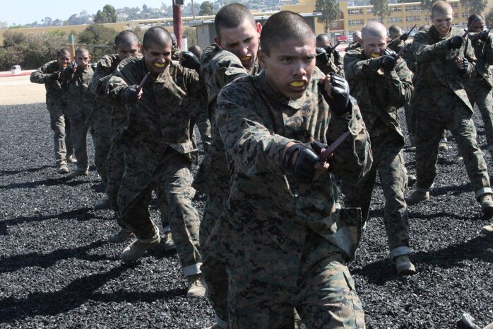 Company I recruits perform various Marine Corps Martial Arts techniques aboard Marine Corps Recruit Depot San Diego July 16. The training is mandatory for recruits to receive their tan belts in MCMAP. For many recruits this was their first time learning chokes and knife techniques.
