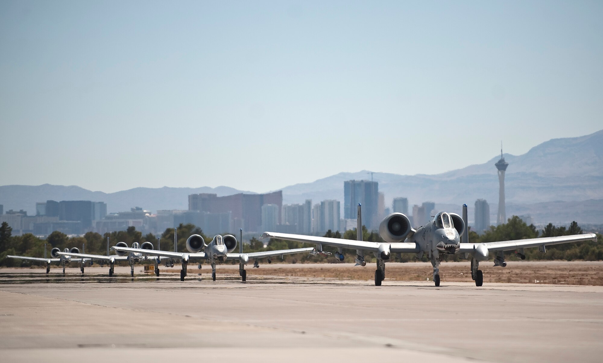 U.S. Air Force A-10C Thunderbolt IIs, from Moody Air Force Base, GA, taxi down down the runway during the Red Flag 12-4 exercise July 18, 2012, at Nellis Air Force Base, Nev. Moody's 23d Wing is the lead wing for Red Flag this year and has more than 200 people deployed to Nellis to support the air combat training exercise. (U.S. Air Force photo by Staff Sgt. Christopher Hubenthal/Released)