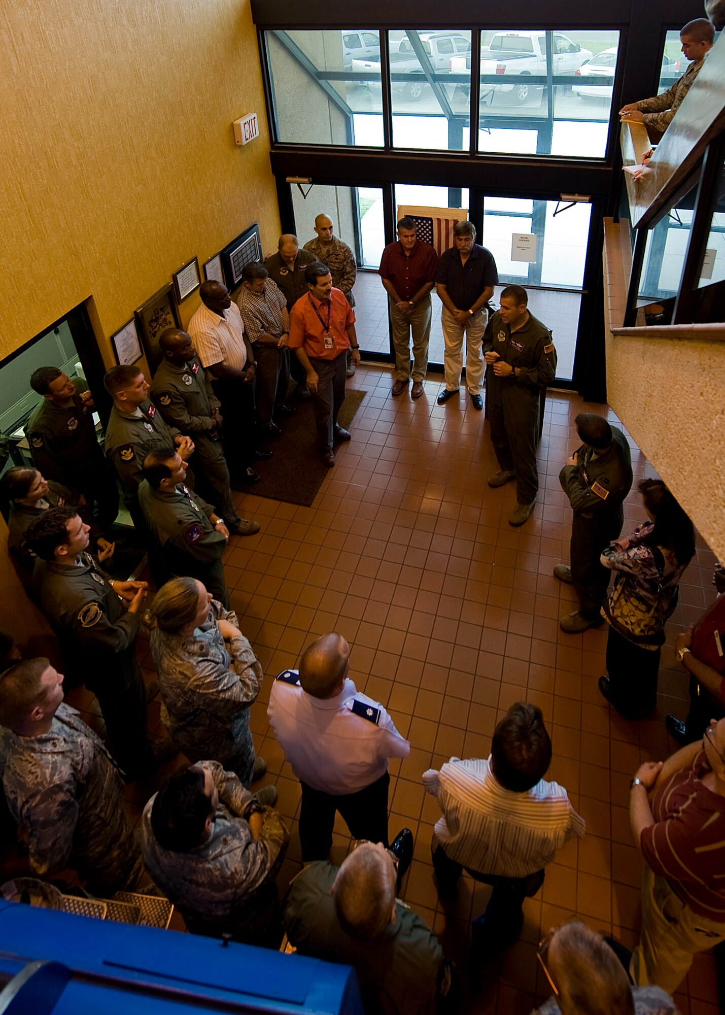U.S. Air Force Col. Walter Ward, 317th Airlift Group commander, speaks to an audience during the C-130 Hercules simulator farewell ceremony July 12, 2012 at Dyess Air Force Base, Texas. The H-model era will come to an end later this year when the last C-130H will be withdrawn from service. The fleet of 33 H-models will be replaced with 28 new C-130Js, making the 317th AG the largest J-model unit in the world. (U.S. Air Force photo by Airman 1st Class Damon Kasberg/Released)