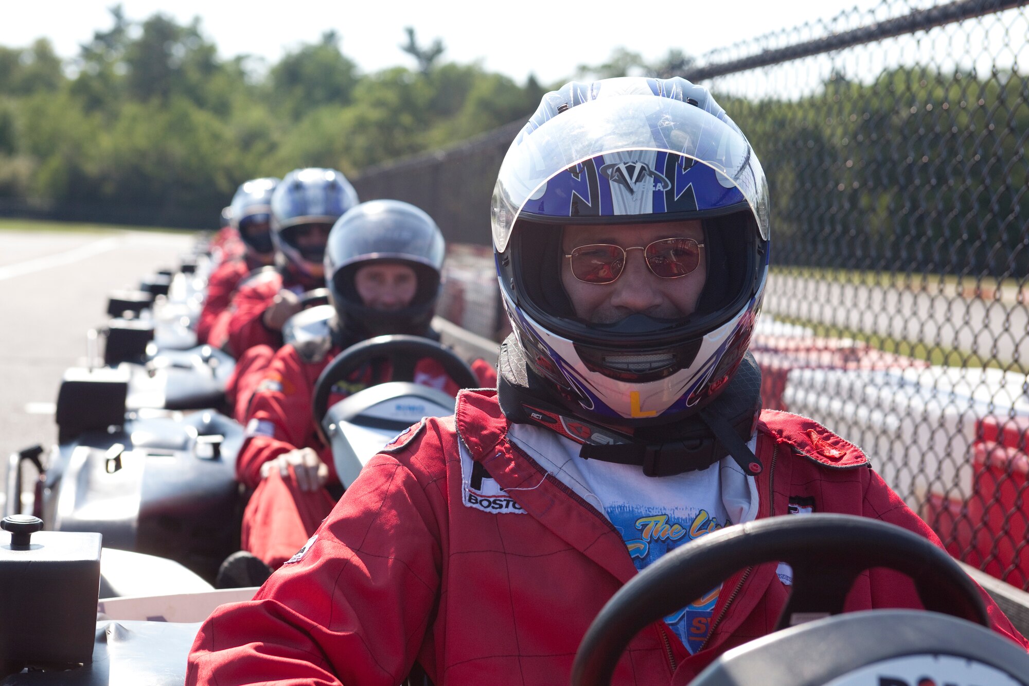 Racers from all over the 102nd Intelligence Wing gathered to cheat death at speeds of almost 50 miles per hour. The Commander’s Cup Racing Event consisted of an 8 lap practice, an 8 lap qualifying round and a 10 lap Championship Race.  For the Cup, points were awarded based on your finishing position. One additional bonus point was added for the driver with the fastest lap, the fastest top speed, and if you were the Wing Commander participating in your final commander’s cup event. (Air National Guard photo by Senior Airman Jeremy Bowcock/Released)
