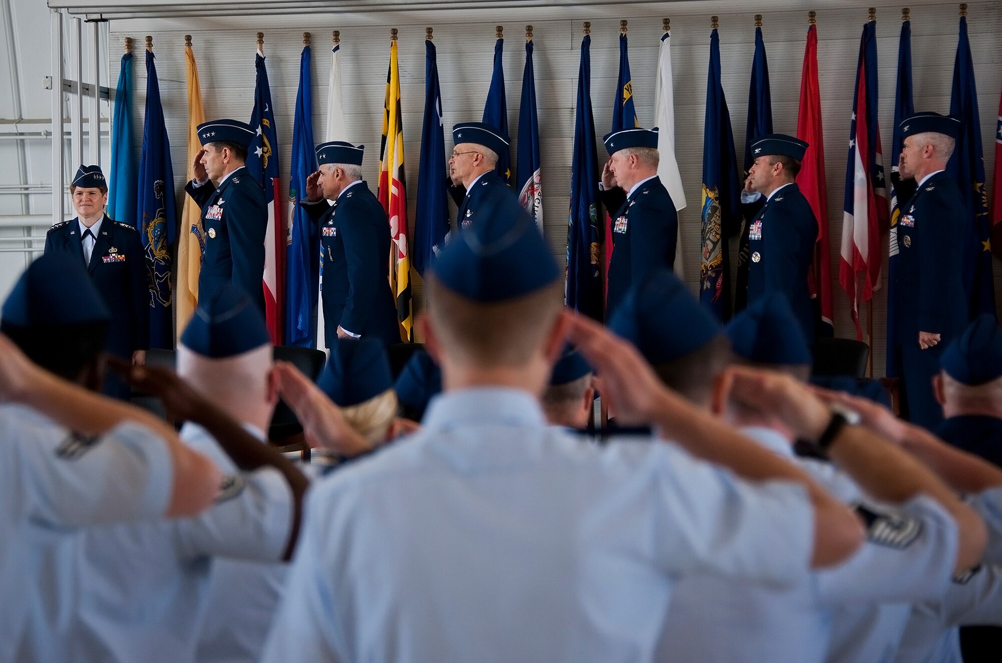 Eglin's Airmen salute Gen. Janet Wolfenbarger, commander of Air Force Materiel Command, at the beginning of the base transition ceremony July 18 at Eglin Air Force Base, Fla.  The official activation of the 96th Test Wing combined the 96th Air Base Wing and 46th Test Wing. (U.S. Air Force photo/Samuel King Jr.)
