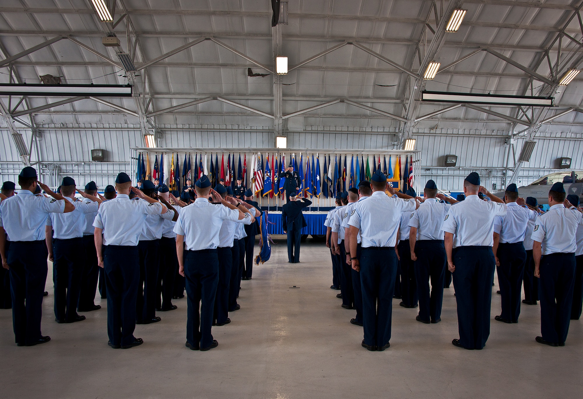 Maj. Gen. Kenneth Merchant salutes the wings under his command for the last time during the base transition ceremony July 18 at Eglin Air Force Base, Fla.  The official activation of the 96th Test Wing combined the 96th Air Base Wing and 46th Test Wing. (U.S. Air Force photo/Samuel King Jr.)
