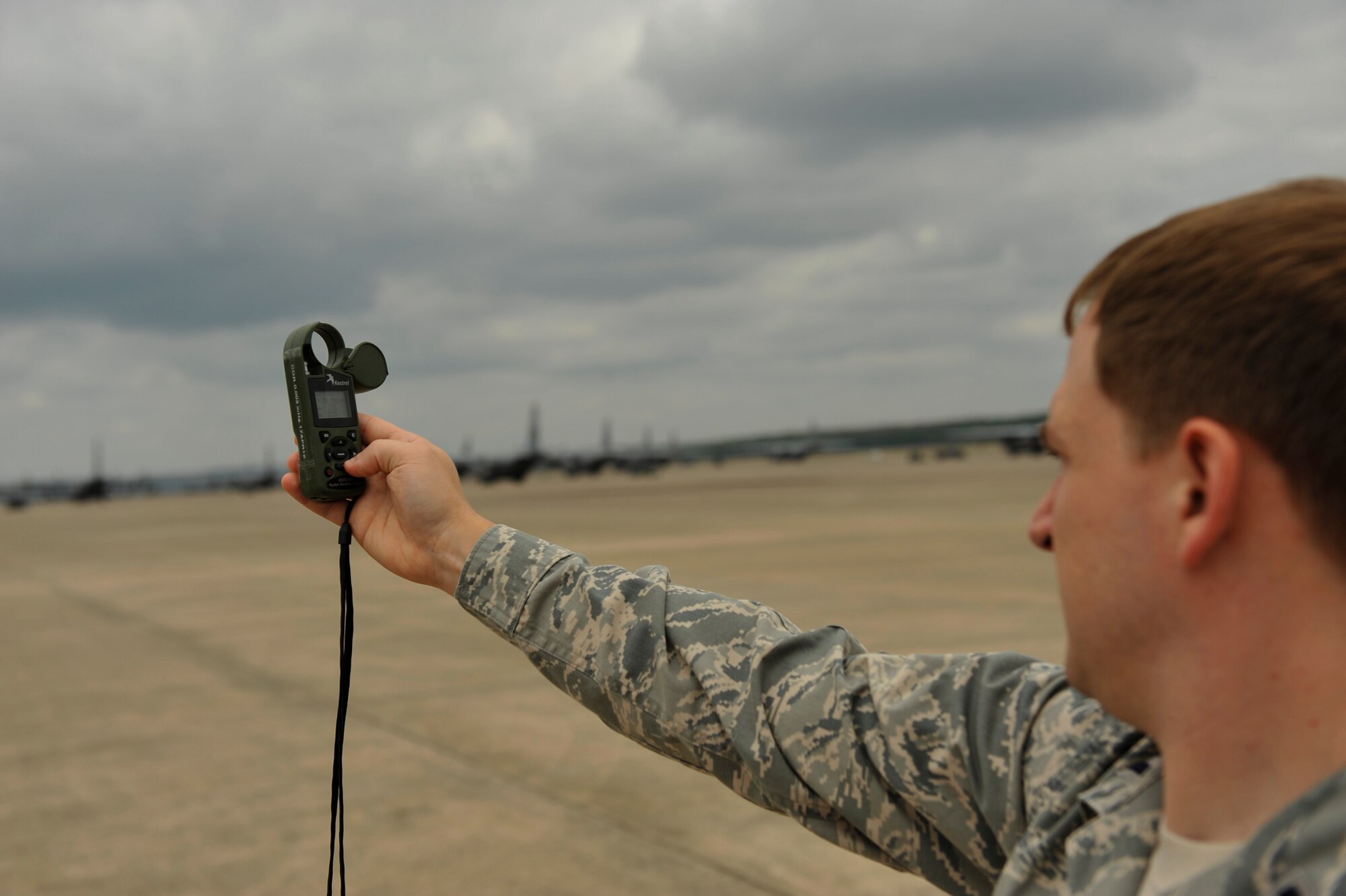 Capt. Matt Hemingway, a 19th Operations Support Squadron weather operations officer, uses a kestrel 4000 for weather observation July 11, 2012, at Little Rock Air Force Base, Ark. The Kestrel 4000 measures wind speed, wind direction, temperature and humidity.(U.S. Air Force photo by Airman 1st Class Rusty Frank)