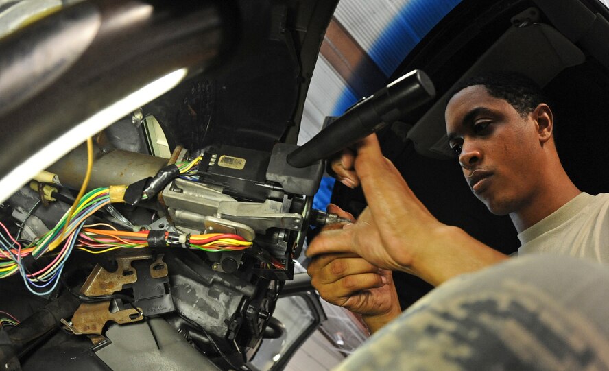 Senior Airman Gerami Brown, 2nd Logistics Readiness Squadron vehicular equipment maintenance journeyman, works on a steering column on Barksdale Air Force Base, La., July 18. From staff cars to bulldozers, vehicular maintenance Airmen make repairs to support team Barksdale's mission. (U.S. Air Force photo/Airman 1st Class Micaiah Anthony)(RELEASED)