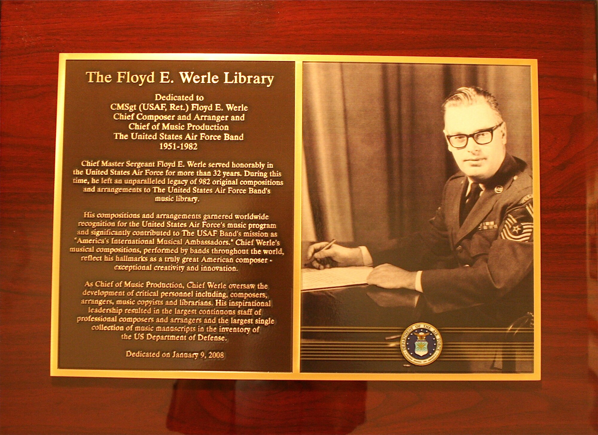The plaque outside The Werle Library at the United States Air Force Band's historic Hanger 2. (AF photo by CMSgt Jan Duga)

