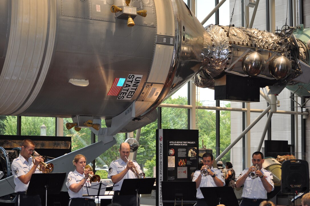The trumpet section of the Concert Band performs at the Air and Space museum as a part of the Band's Summer Concert Series. (AF photo by SMSgt Jenn Pagnard)