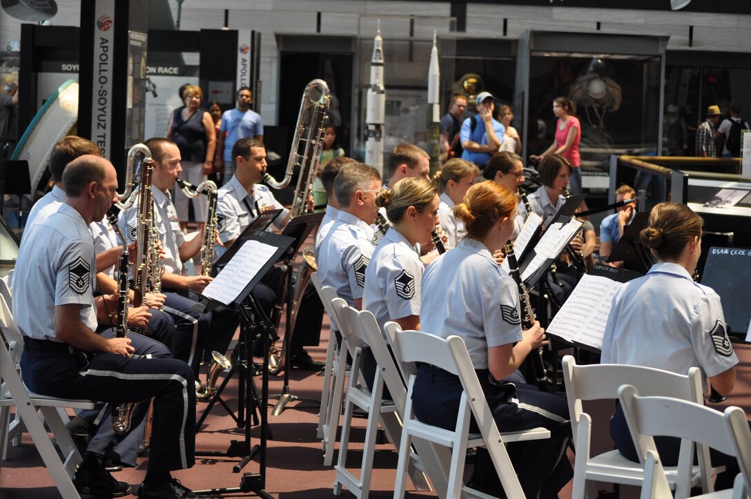 The clarinet section of the Concert Band performs as a clarinet choir at the
Air and Space museum as a part of the Band's Summer Concert Series. (AF
photo by SMSgt Jenn Pagnard)