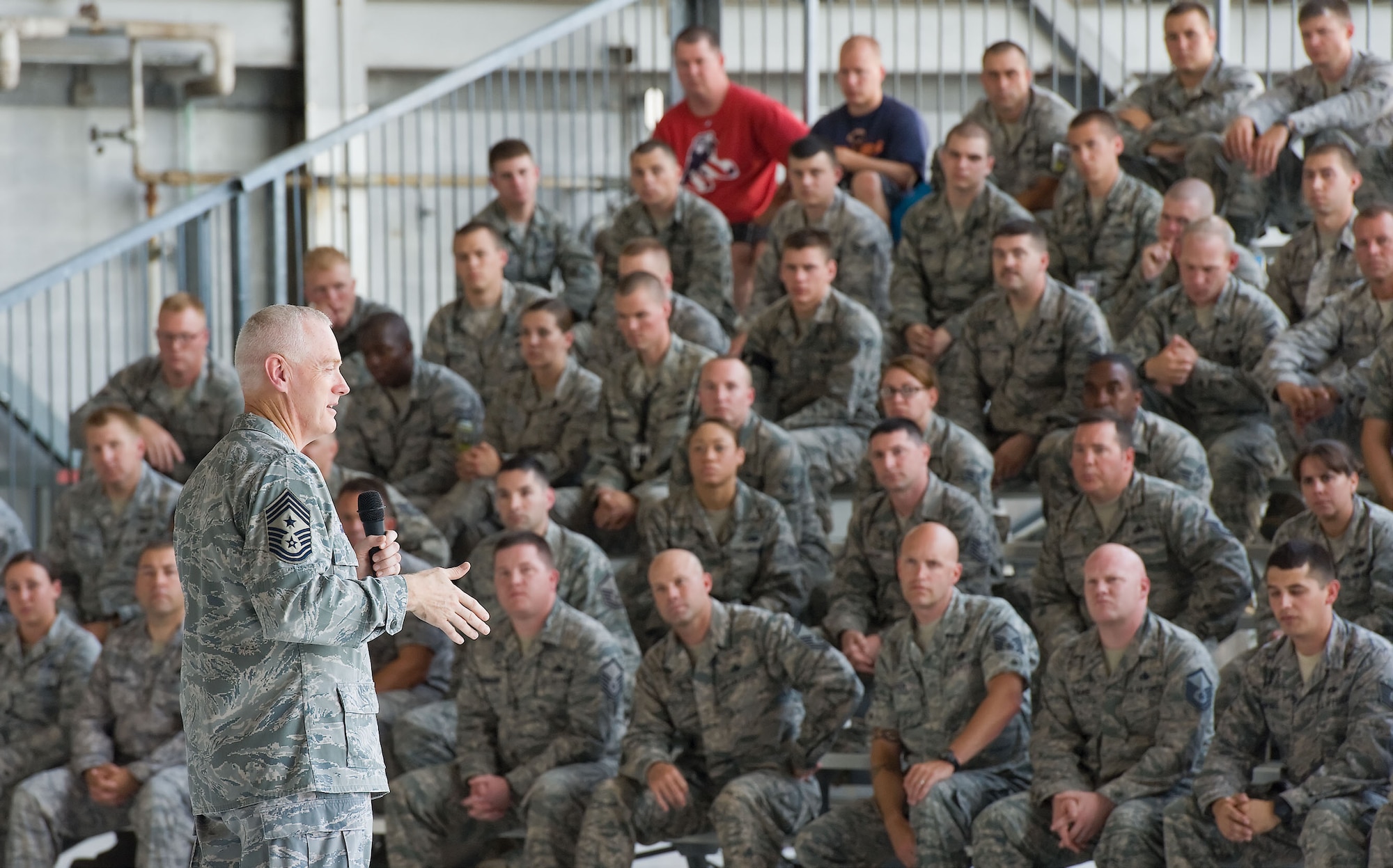 Chief Master Sgt. Richard Kaiser, command chief master sergeant of Air Mobility Command, Scott Air Force Base, Ill., speaks to members of the 436th Maintenance Group July 17, 2012, at the Dover Air Force Base, Del., Isochronal Dock. During his one-day stop at Dover AFB, Kaiser conversed with Airmen throughout various base agencies. (U.S. Air Force photo/Roland Balik)