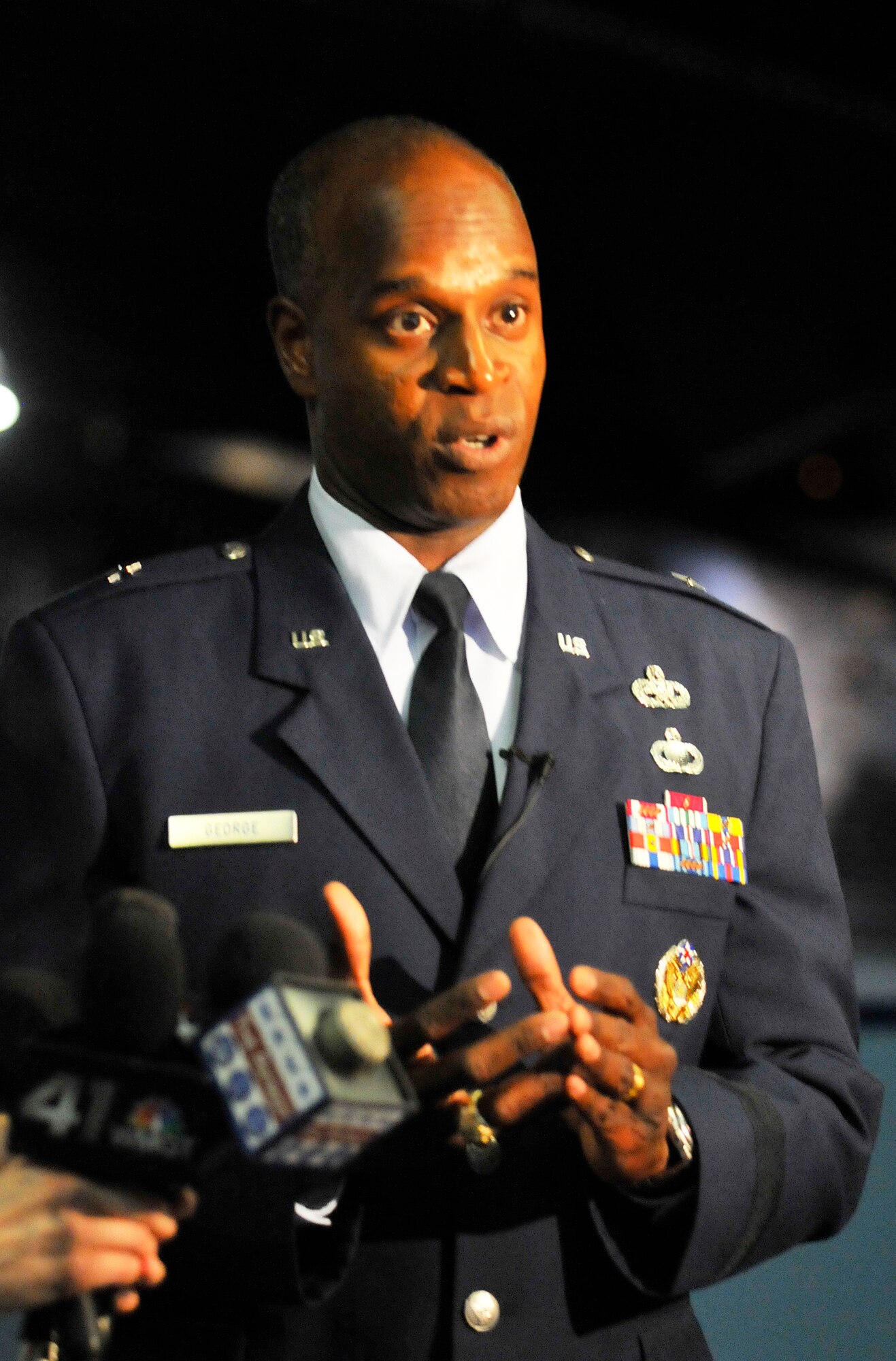 Brig. Gen. Cedric D. George talks with media prior to the ceremony for the standup of  the Warner Robins Air Logistics Complex July 17.  (U. S. Air Force photo/Sue Sapp)