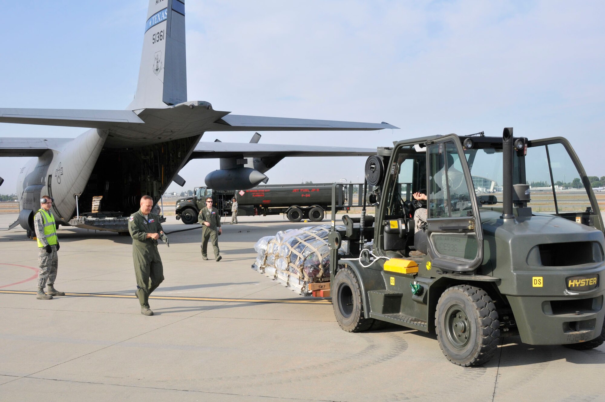 On July 13, Airmen of the 144th Fighter Wing’s Logistic Readiness Squadron along with the 136th Airlift Wing’s C-130 crew load the last pallet of cargo leaving for the Rim of the Pacific (RIMPAC) exercise taking place at Joint Base Pearl Harbor-Hickam.  The 2012 RIMPAC exercise is the twenty-third maneuver in a history of bi-annual drills that dates back four decades. The purpose of the exercise is to bring together nations to observe, train and exchange information that fosters a cooperative training environment. (Air National Guard photograph by Senior Master Sgt. Chris Drudge)