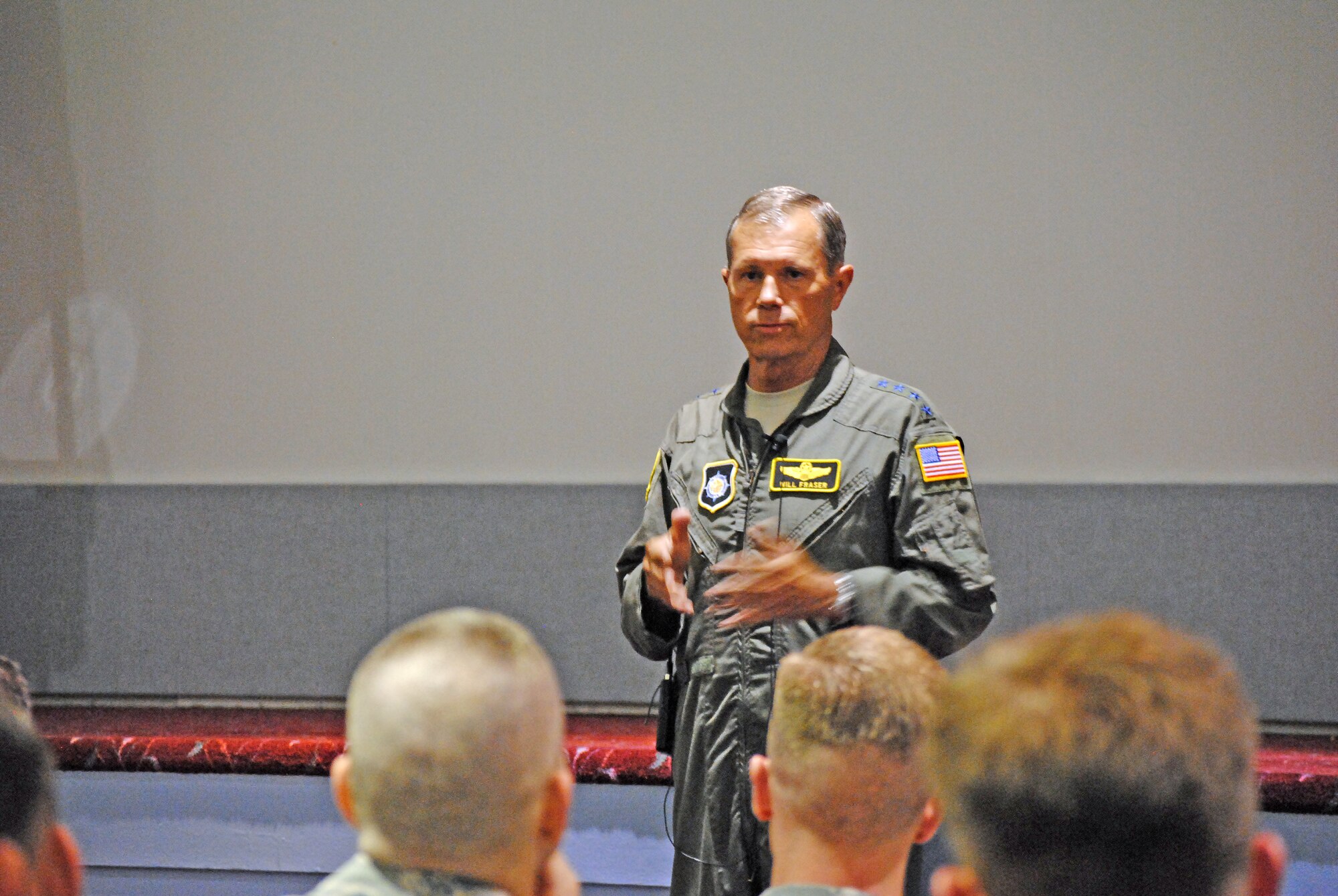 Gen. William H. Fraser III, U.S. Transportation Command commander, thanks McChord Field Airmen for their service during a commander’s call July 17, 2012, at Joint Base Lewis-McChord, Wash. During his visit, Fraser also delivered a new C-17 Globemaster III aircraft. (U.S. Air Force photo/ Capt. Tawny Dotson)