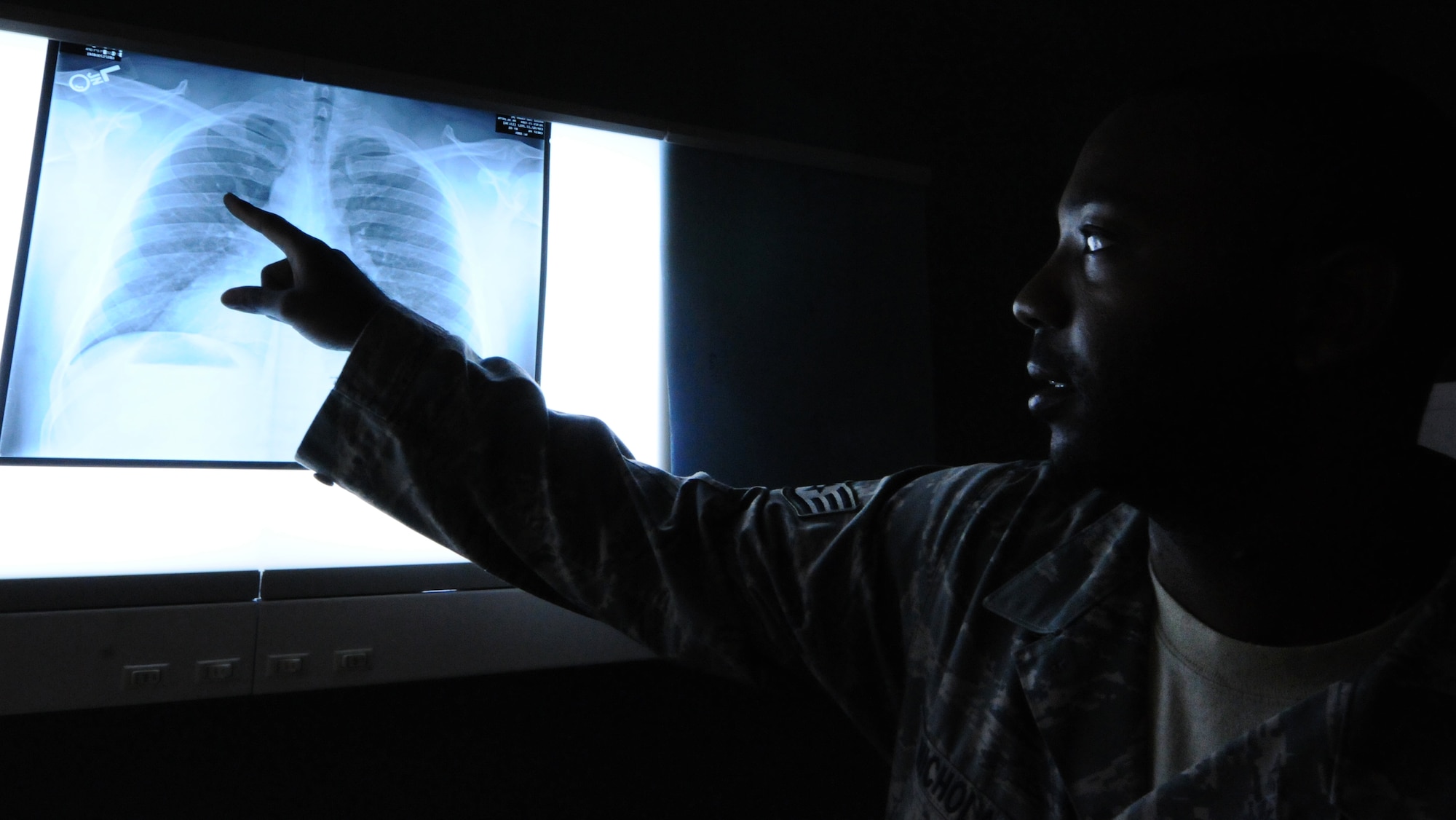 ANDERSEN AIR FORCE BASE, Guam – Staff Sgt. Jahmal Nicholas, 36th Medical Support Squadron diagnostics imaging craftsman, reviews a patient’s chest x-ray July 18. A x-ray allows a more in-depth look into any anomalies the patient may have. (U.S. Air Force photo by Senior Airman Carlin Leslie/Released)
