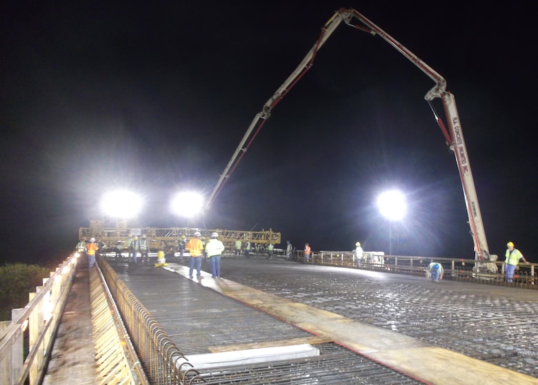 FLORIDA — U.S. Army Corps of Engineers Jacksonville District employees and contractor, Kiewit Construction, work through the night to complete the first concrete pour on the bridge deck for theTamiami Trail Modifications project, July 13, 2012.