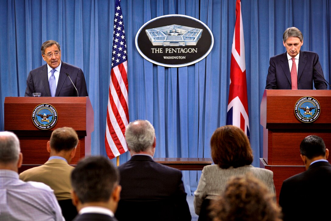 Defense Secretary Leon E. Panetta and British Defense Secretary Philip Hammond hold a press conference at the Pentagon, July 18, 2012.
