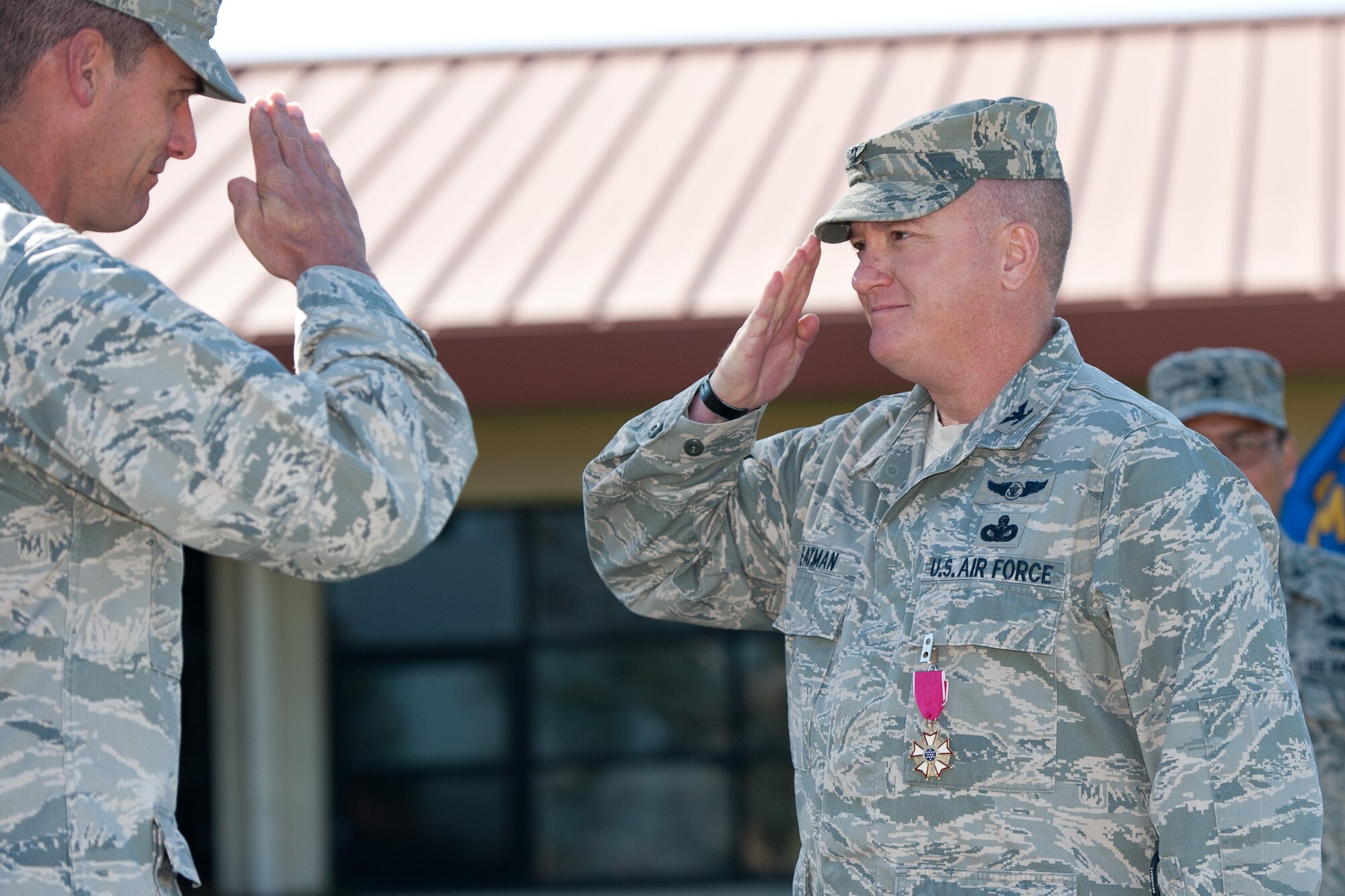 60th Air Mobility Wing commander, Col. Dwight Sones, presents former 60th Mission Support Group commander, Col. Robert Eatman, with the Legion of Merit upon relinquishing command.  (USAF Photo/Ken Wright)