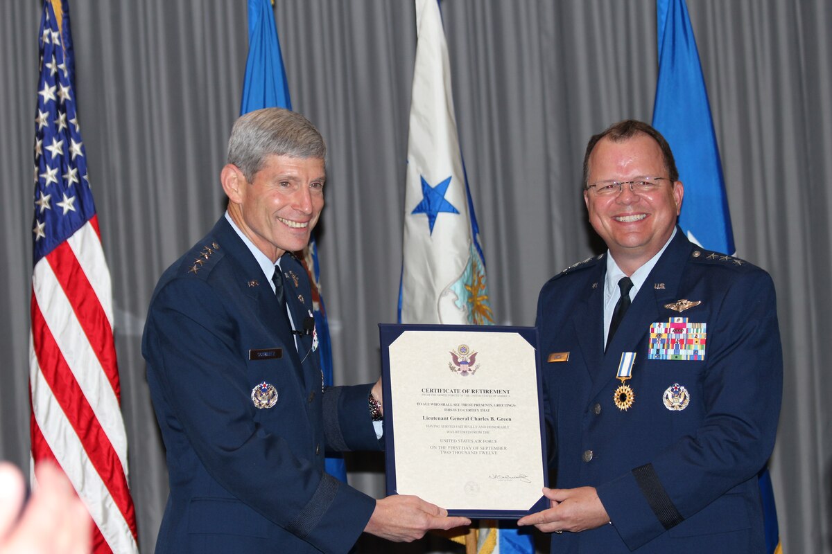 Air Force Chief of Staff Gen. Norton A. Schwartz officiates the retirement of Lt.  Gen. Charles B. Green, Air Force Surgeon General, after 34 years of service during a ceremony on July 19 at the Bolling Club. (Photo by Jon Stock, U.S. Air Force)