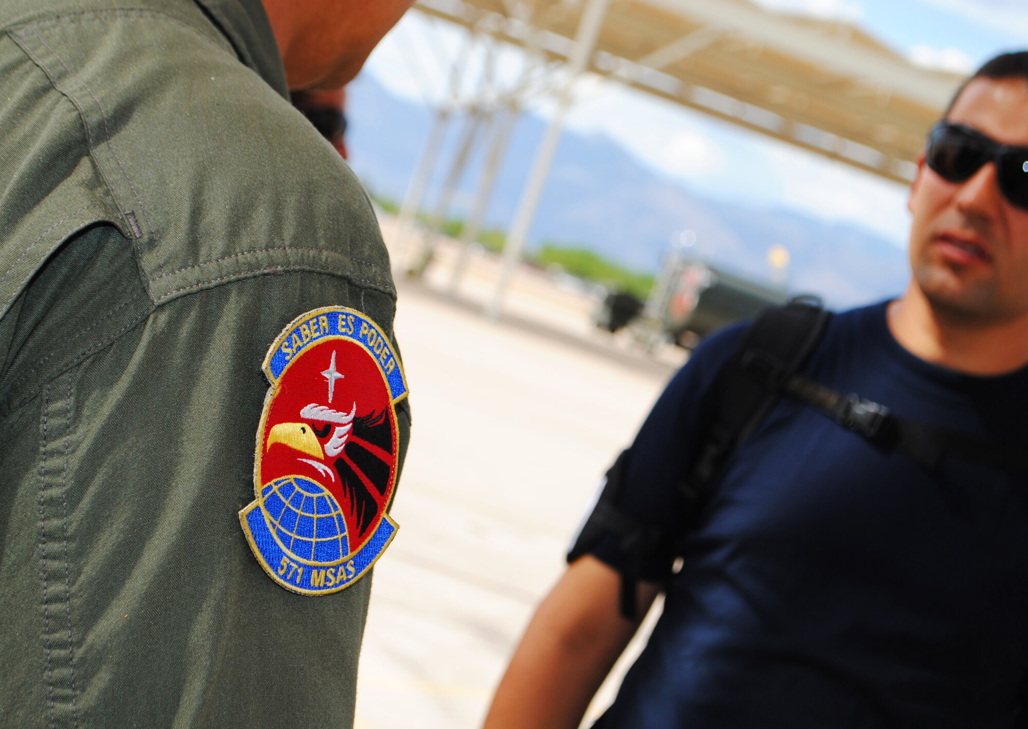 A 571st Mobility Support Advisory Squadron member works side-by-side with Colombian air force members to exchange invaluable knowledge in preparation for Colombia's first participation at Red Flag. (U.S. Air Force photo by Staff Sgt. John Ayre)