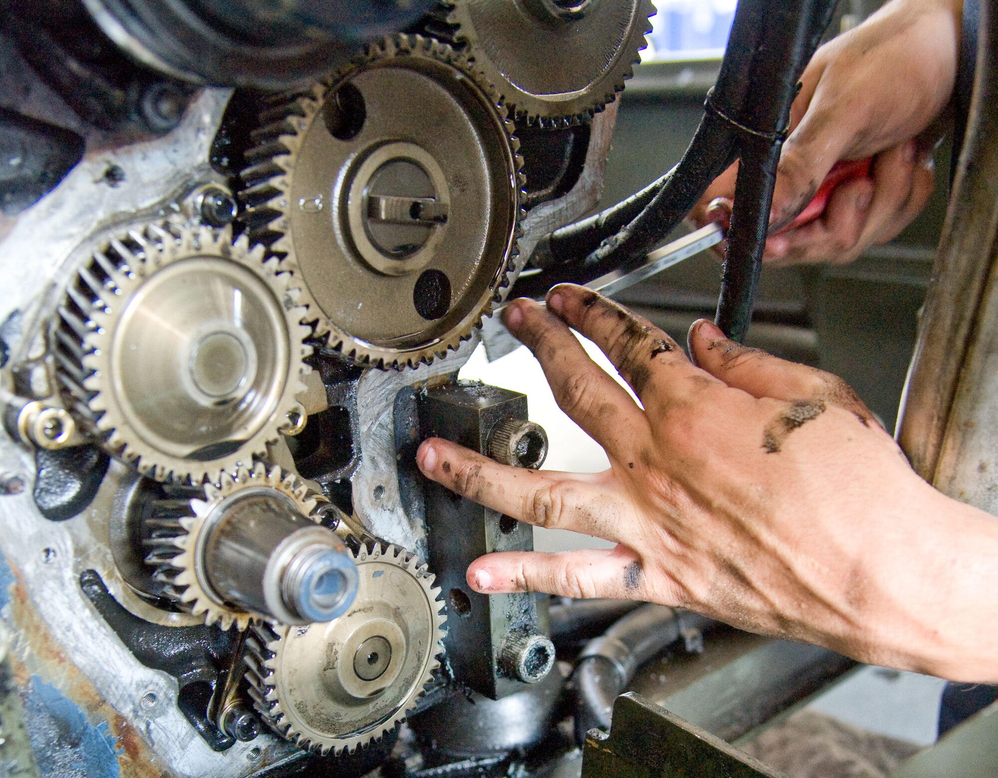 Airman Dyllan Arnold, materials handling and equipment apprentice with the 436th Logistics Readiness Squadron, replaces a front main seal on an engine July 18, 2012, at Dover Air Force Base, Del. The main seal holds all fluids in the engine. (U.S. Air Force photo by Adrian R. Rowan)