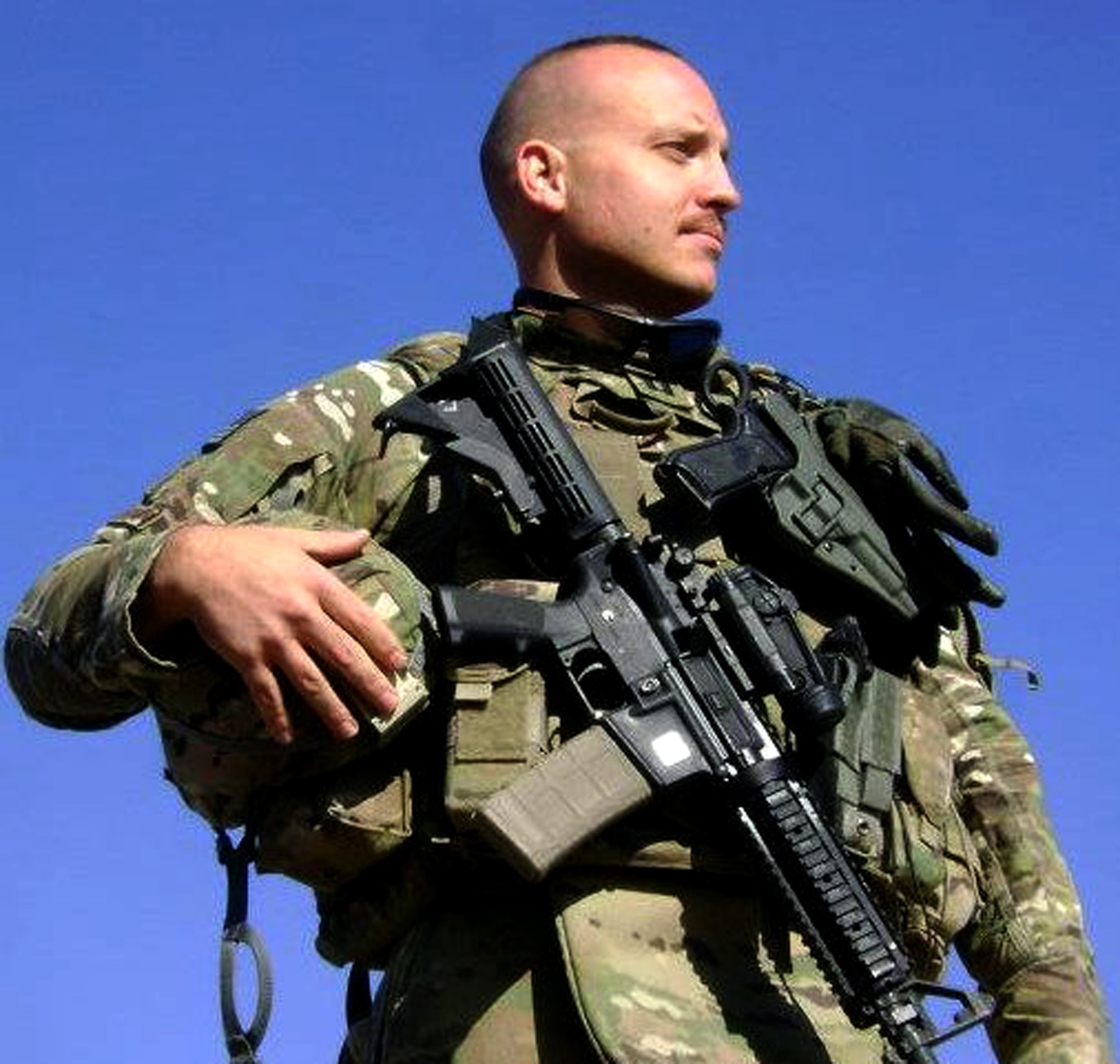 Capt. David Wennerstrom, 442nd Civil Engineer Squadron assistant operations flight commander, overlooks the Pakistan border from the vantage point of an abandoned outpost. The 442nd CES is part of the 442nd Fighter Wing, an A-10 Thunderbolt II Air Force Reserve unit at Whiteman Air Force Base, Mo. (U.S. Air Force photo/courtesy photo)