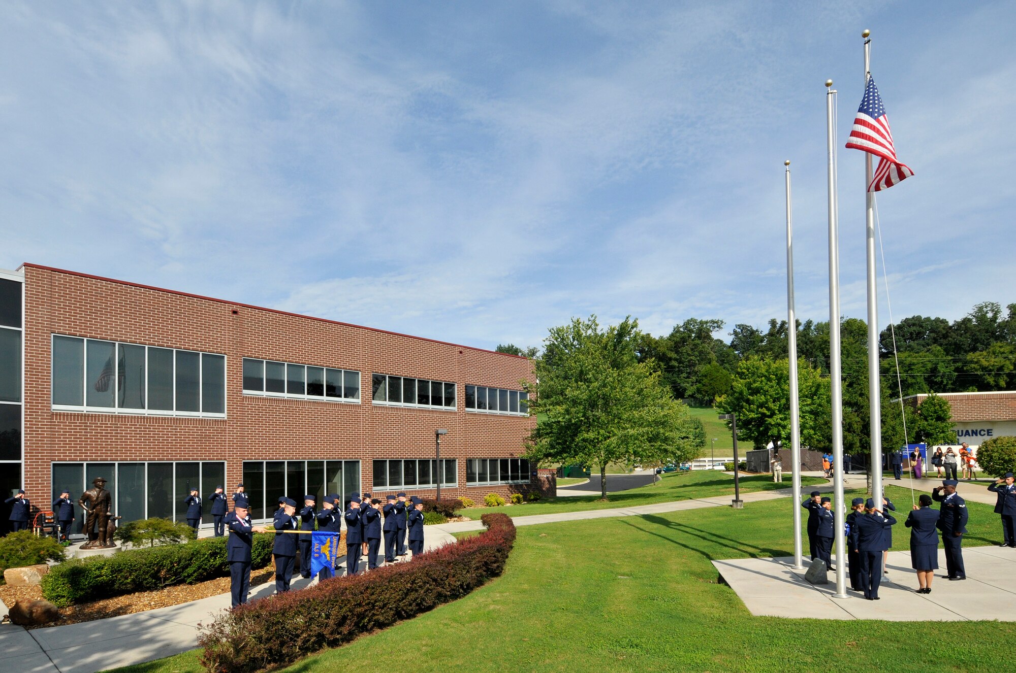 MCGHEE TYSON AIR NATIONAL GUARD BASE, Tenn. - An Airman Leadership School class performs a retreat ceremony outside Patriot Hall, July 18, 2012. Today's ALS was first taught on campus in 1991 and returned again in 1999 after a hiatus, but it really began as the NCO Leadership School in 1970 and is also tied to 1988 as a NCO preparatoy course. The TEC begin rebroadcastng satellite ALS in 2013 to the Air Guard's TEC TV Warrior Network downlink sites across the nation. (U.S. Air National Guard photo by Master Sgt. Kurt Skoglund/Released)