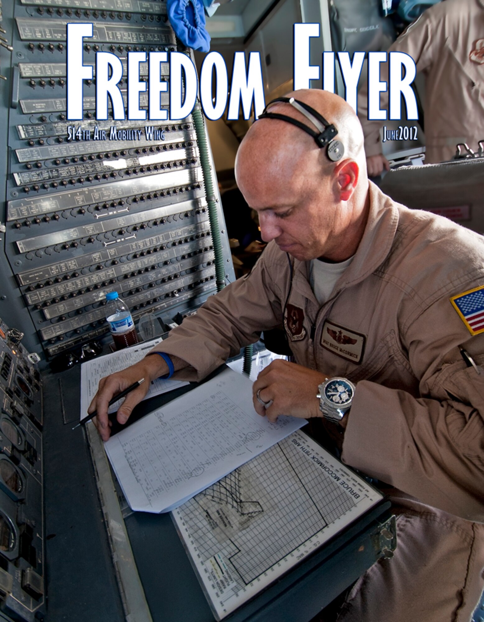 Master Sgt. Bruce McCormick, a flight engineer with the 78th Air Refueling Squadron, reviews flight documents in a KC-10 Extender at Royal Air Force Mildenahall, England, May 23 prior to flying home from a two-month deployment in the Middle East. (U.S. Air Force photo by Shawn J. Jones)