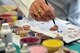 Ret. Master Sgt. Nancy Hansen paints a prosthetic ear for wounded warriors at San Antonio Military Medical Center, San Antonio, Texas, on July 11, 2012. Hansen is one of two anaplastology's in the DOD. (U.S. Air Force photo/Desiree N. Palacios)