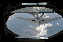 A KC-135 Stratotanker, with the 22nd Air Refueling Wing, refuels a B-2 Spirit, with the 509th Bomb Wing, July 12, 2012. The 509th BW can launch combat sorties directly from Missouri to any spot on the globe, engaging adversaries with large payloads of traditional or precision-guided munitions. (U.S. Air Force photo/Airman 1st Class Maurice A. Hodges)