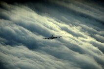 A KC-135 Stratotanker, with the 756th Air Refueling Squadron, flies through storm clouds on its way to meet up with and refuel a C-17 Globemaster III, with the 15th Airlift Squadron, during exercise "Global Eagles" off the east coast of Florida on July 12, 2012. The KC-135 was the U.S. Air Force's first jet-powered refueling tanker and replaced the KC-97 Stratotanker. (U.S. Air Force photo/Master Sgt. Jeremy Lock) 