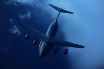 A C-17 Globemaster III, with the 15th Airlift Squadron, pulls away from behind a KC-135 Stratotanker, with the 756th Air Refueling Squadron, during exercise Global Eagles after receiving fuel off the east coast of Florida on July 12, 2012. The C-17 is used for rapid strategic airlift of troops and cargo to main operating bases or forward operating bases throughout the world. (U.S. Air Force photo/Master Sgt. Jeremy Lock)