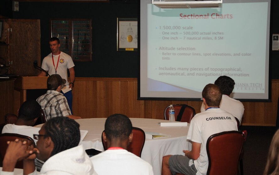 Louisiana Gaining Early Awareness and Readiness for Undergraduate Program students attend a class at the Barksdale Club on Barksdale Air Force Base, La., July 18. The class dealt with airports and the importance of understanding flight patterns and rules. LA GEAR UP prepares students for things they may encounter while pursuing a career in aviation. (U.S. Air Force photo/Senior Airman Sean Martin)(RELEASED)
