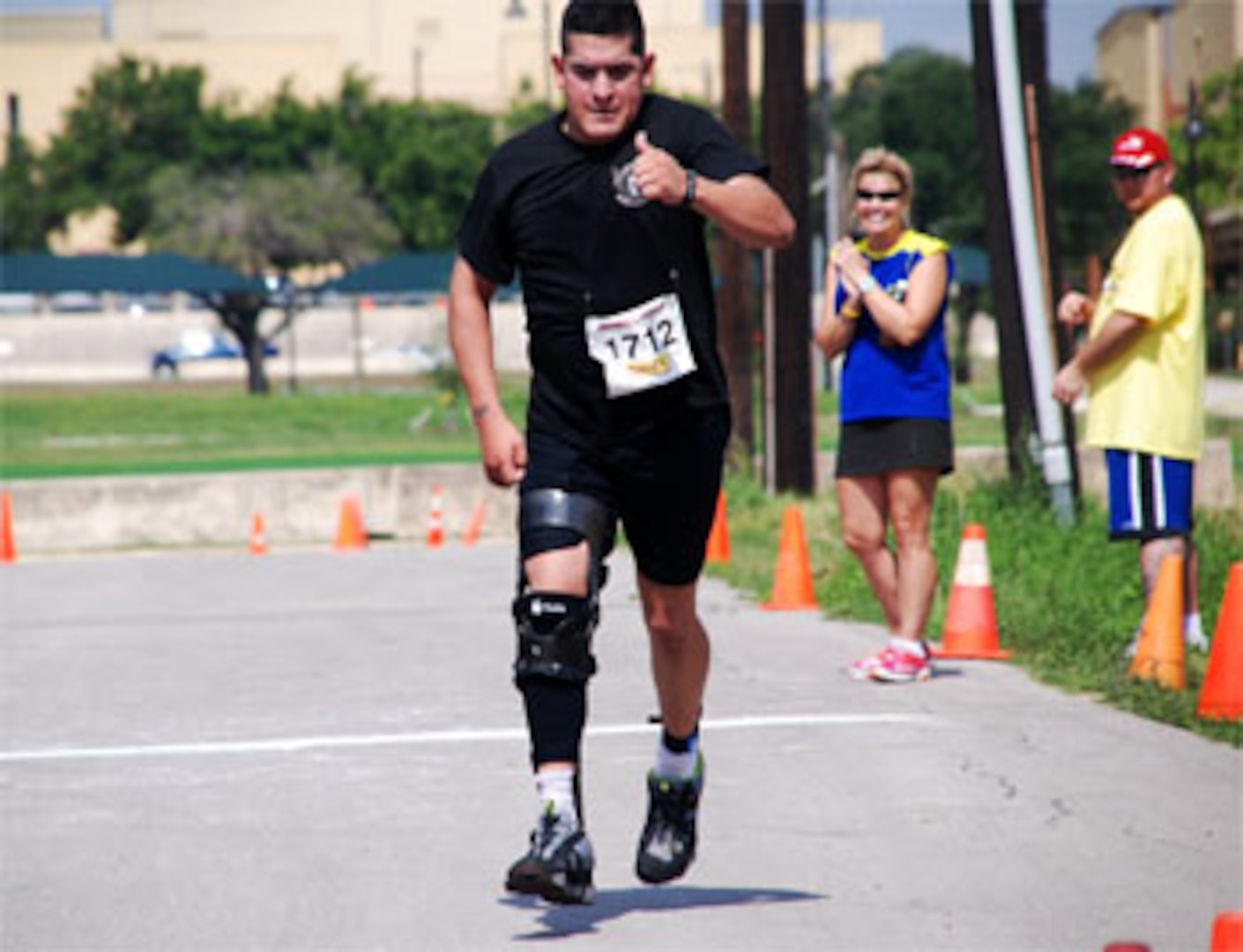 Marine Staff Sgt. Mark Juarez completes a 2-mile run/walk in the Mini-Try held at Joint Base San Antonio Fort Sam Houston May 18.  (Photo by Maria Gallegos)