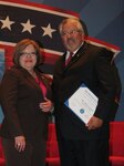 Margaret Moran, League of Latin American Citizens National President, presents the 2012 Excellence in Military Service award to Jaime Cavazos, Chief, MEDCOM Public Affairs Officer, at the LULAC National Convention & Exposition June 26. (U.S. Army photo by Melissa Cavazos)