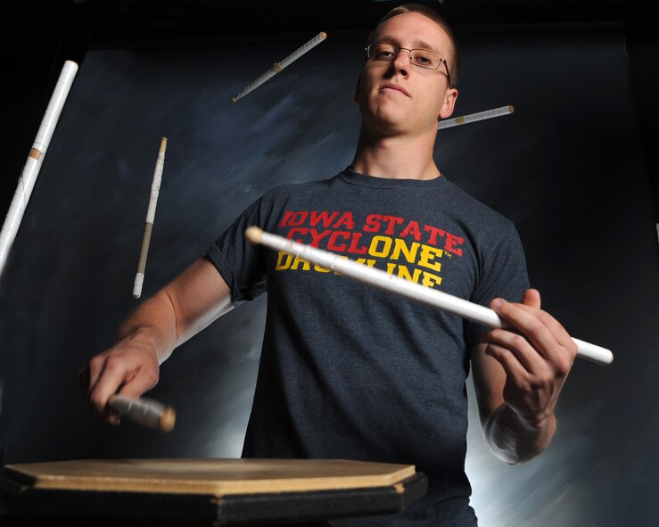 Airman 1st Class Alexander Shiverick, 319th Civil Engineer Squadron, beats on the drum pad July 19, 2012, on Grand Forks Air Force Base, N.D.  Shiverick was named the latest Warrior of the Week for the 319th Air Base Wing. (U.S. Air Force photo by Airman 1st Class Xavier Navarro)