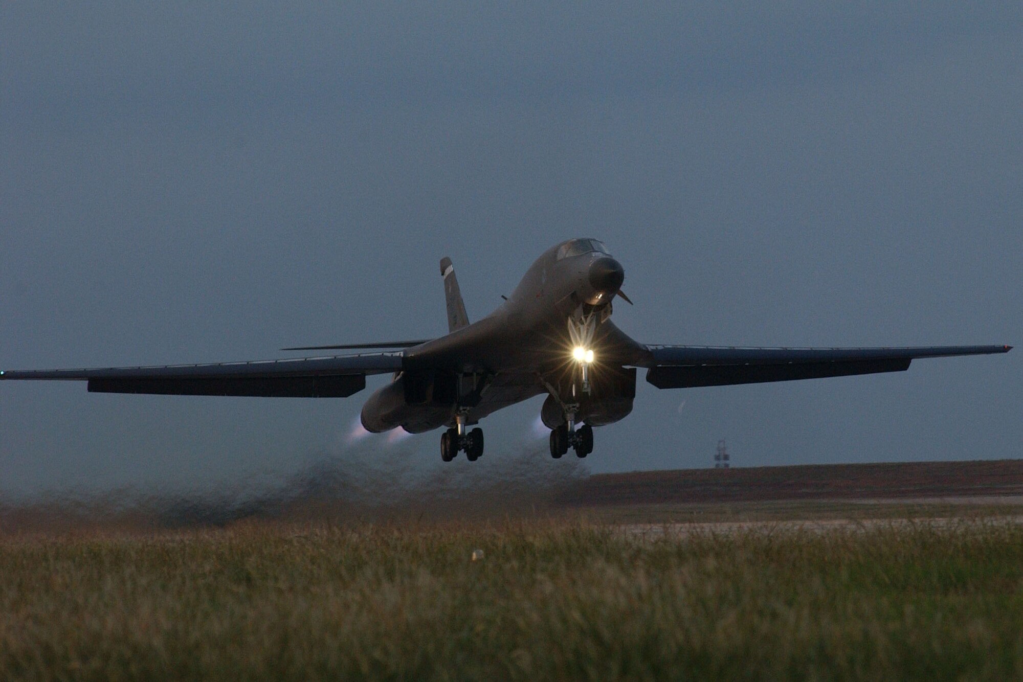 A B-1 Bomber from the 28th Bomb Squadron takes-off at dusk Feb. 27, 2009, at Dyess Air Force Base, Texas. The mission of the 28th BS is to provide the B-1 community with the most capable new combat aviators, while maintaining a current, deployable and relevant instructor corps. (Courtesy photo)