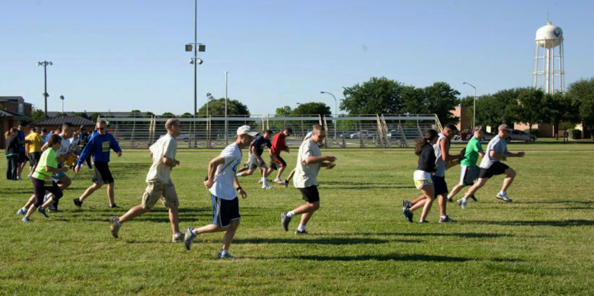 Teams take off after receiving their first clue in Sheppard’s “Race 2 Awareness” run on April 21. This was an 'Amazing Race' type event where teams of two ran to different agencies on base to get clues that would lead them to their next obstacle. The SARC Office participated as one of the sponsors of the race. (U.S. Air Force/Courtesy Photo)
