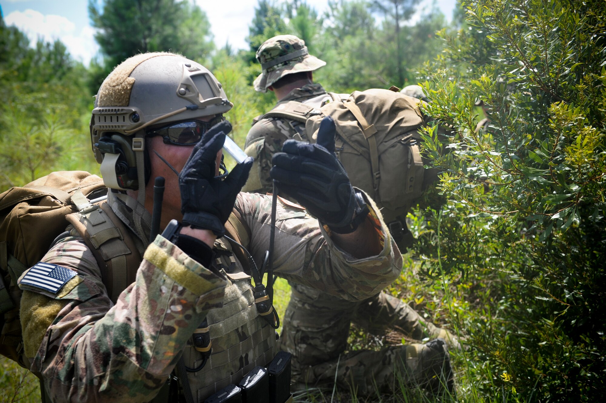 U.S. Air Force 1st Lt. Andrew Hendel, 38th Rescue Squadron combat rescue officer, uses a signal mirror during a training scenario at Moody Air Force Base, Ga., July 16, 2012. Hendel used the mirror to help the evacuation team locate their position. (U.S. Air Force photo by Airman 1st Class Douglas Ellis/Released)
