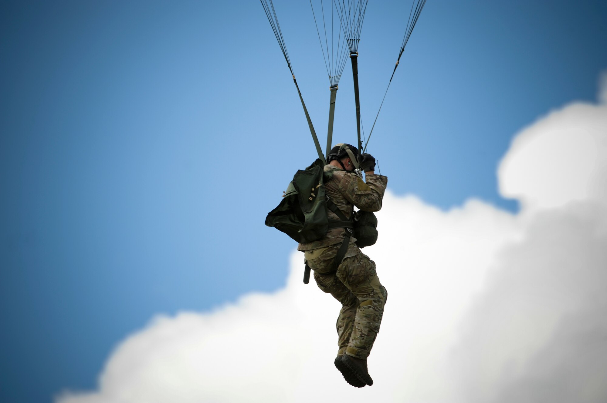 U.S. Air Force Master Sgt. Philip Gacek, 38th Rescue Squadron pararescueman, descends to a drop zone at Moody Air Force Base, Ga., July 16, 2012. Members on jump status are required to keep current on their training to remain jump qualified. (U.S. Air Force photo by Airman 1st Class Douglas Ellis/Released)
