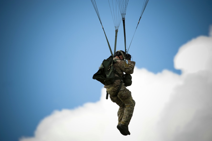 U.S. Air Force Master Sgt. Philip Gacek, 38th Rescue Squadron pararescueman, descends to a drop zone at Moody Air Force Base, Ga., July 16, 2012. Members on jump status are required to keep current on their training to remain jump qualified. (U.S. Air Force photo by Airman 1st Class Douglas Ellis/Released)
