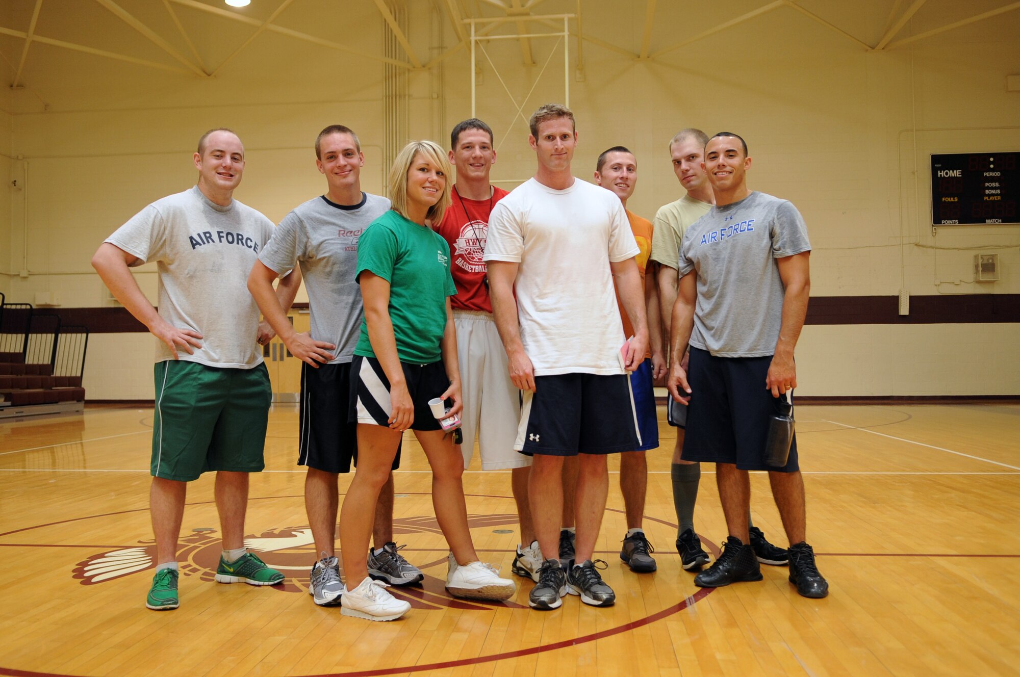 U.S. Air Force Airmen from the 4th Civil Engineer Squadron pose for a victory photo after the Friday the 13th dodge ball tournament on Seymour Johnson Air Force Base, N.C., July 13, 2012. The 4th CES team won the tournament after a final match against Airmen from the 4th Force Support Squadron. (U.S. Air Force photo/Airman 1st Class Aubrey Robinson/Released)