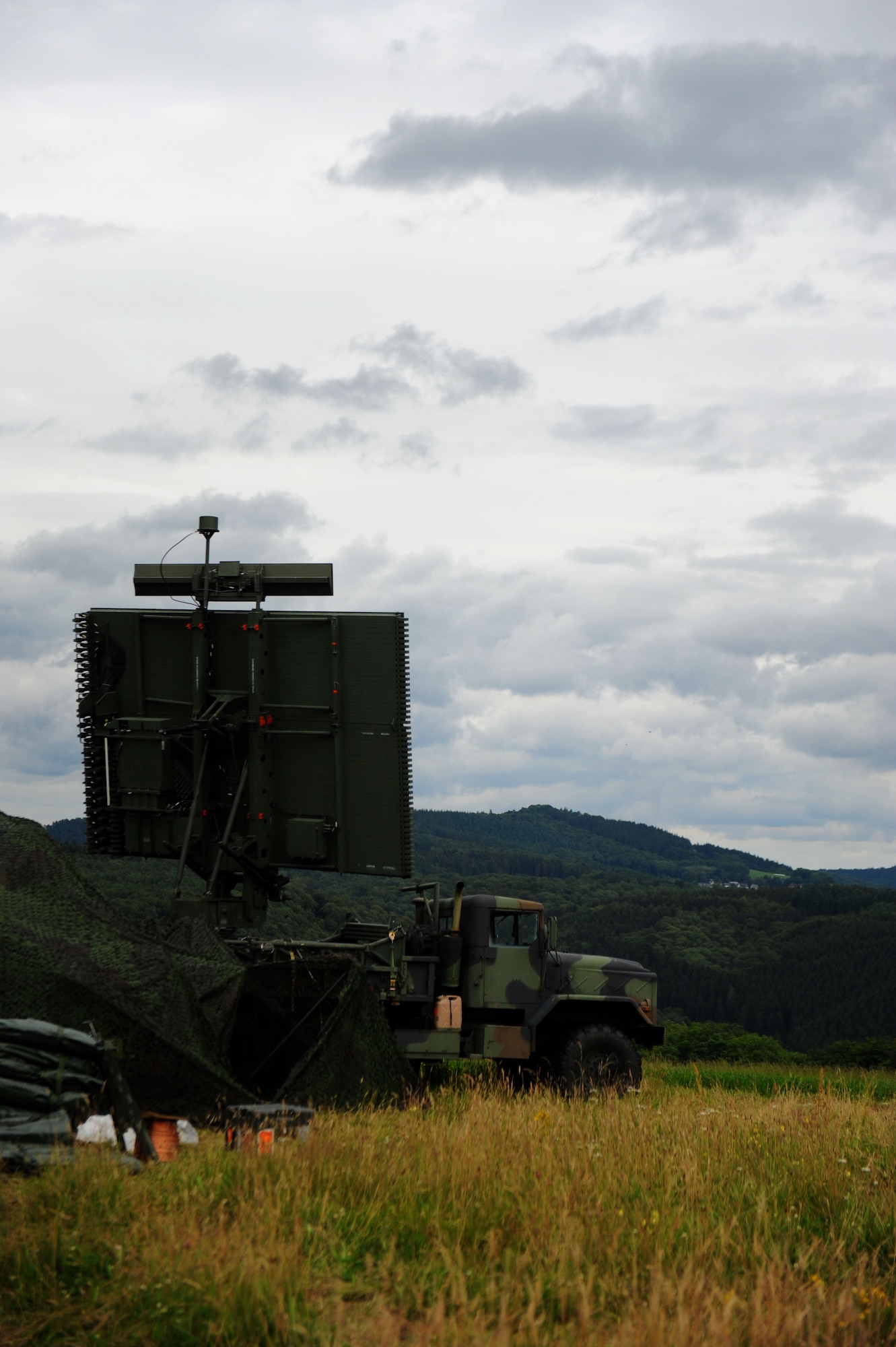 GEROLSTEIN, Germany – An AN/TPS-75 transportable Aerospace Control and Warning radar sits atop a hill for Eifel Strike 2012 here July 16.  Eifel Strike is an annual field training exercise during which Airmen build a controlled radar site as well as a control and reporting center to work and live out of for a week. Exercises like this are designed to give Spangdahlem Airmen the practice, skills and experience they need to deploy efficiently and effectively within a moment’s notice in support of contingency operations around the world. (U.S. Air Force photo by Airman 1st Class Gustavo Castillo/Released)